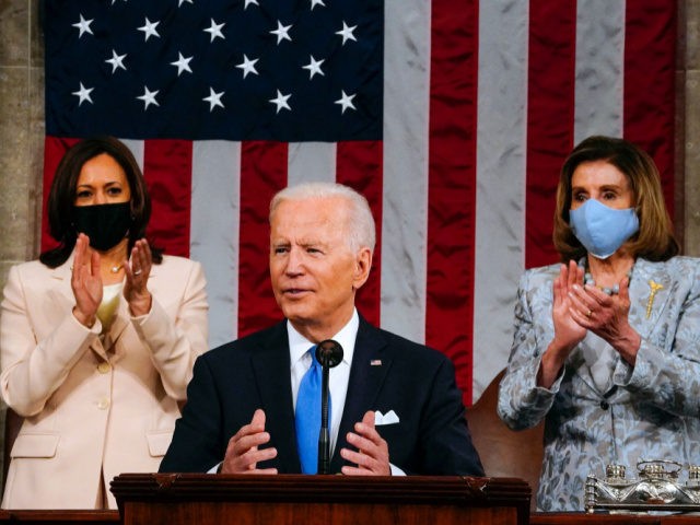 US Vice President Kamala Harris (L) and Speaker of the House of Representatives Nancy Pelos (R) applaud as US President Joe Biden addresses a joint session of Congress at the US Capitol in Washington, DC, on April 28, 2021. (Photo by Melina Mara / POOL / AFP) (Photo by MELINA …