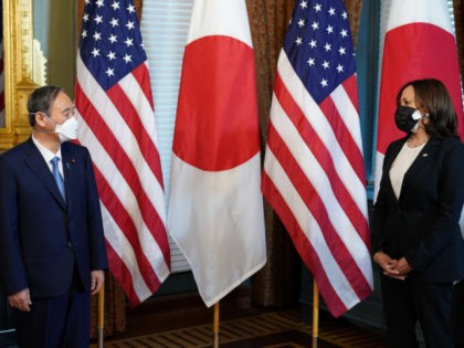 US Vice President Kamala Harris (R) hosts Japanese Prime Minister Yoshihide Suga ahead of