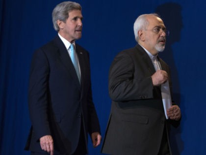 US Secretary of State John Kerry (L) and Iranian Foreign Minister Javad Zarif arrive to deliver a statement at the Swiss Federal Institute of Technology in Lausanne (Ecole Polytechnique Federale De Lausanne) on April 2, 2015, after Iran nuclear program talks finished with extended sessions. European powers and Iran on …
