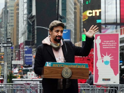 Actor Lin-Manuel Miranda delivers his remarks in Times Square after he toured the grand opening of a Broadway COVID-19 vaccination site intended to jump-start the city's entertainment industry, in New York, Monday, April 12, 2021. (AP Photo/Richard Drew)