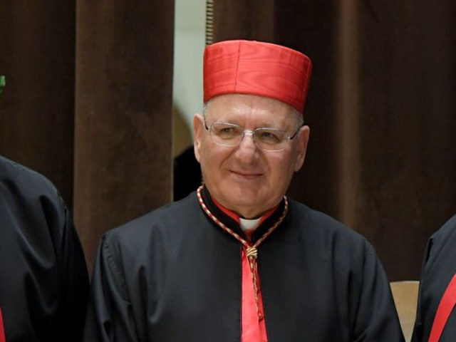 New Cardinal Louis Raphael I Sako of Iraq (C) poses with bishops as he attends the courtes