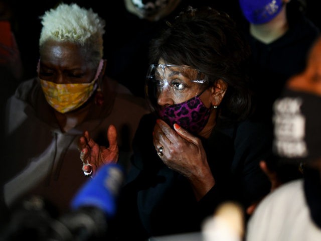 Representative Maxine Waters(C) (D-CA) speaks to the media during an ongoing protest at the Brooklyn Center Police Department in Brooklyn Centre, Minnesota on April 17, 2021. - Police officer, Kim Potter, who shot dead Black 20-year-old Daunte Wright in a Minneapolis suburb after appearing to mistake her gun for her …