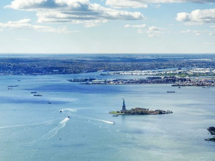 panoramic view of the Upper Bay in New York with Statue of Liberty and Staten Island in the distance