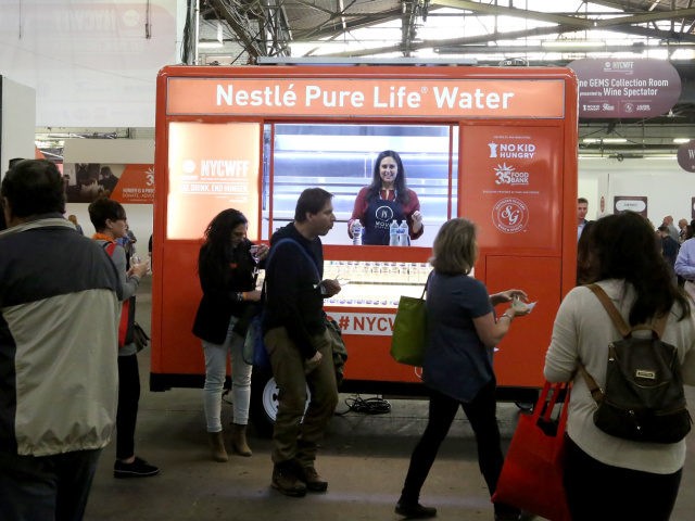 NEW YORK, NY - OCTOBER 12: The Nestle Pure Life Water booth at the Food Network & Cooking Channel New York City Wine & Food Festival presented by Capital One - Beverage Media presents Southern Glazer's Wine & Spirits Trade Tasting hosted by Wine Spectator PLUS Trade Panels at Pier …