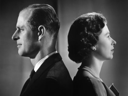 LONDON - DECEMBER 1958: Queen Elizabeth II and Prince Philip, Duke of Edinburgh pose for a portrait at home in Buckingham Palace in December 1958 in London, England. (Photo by Donald McKague/Michael Ochs Archives/Getty Images)
