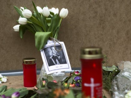 A portrait of Britain's Prince Philip is placed with flowers and candles in front of the British embassy in Berlin, Germany, Saturday, April 10, 2021. Britain's Prince Philip, husband of Queen Elizabeth II, who spent more than seven decades supporting his wife in a role that mostly defined his life, …