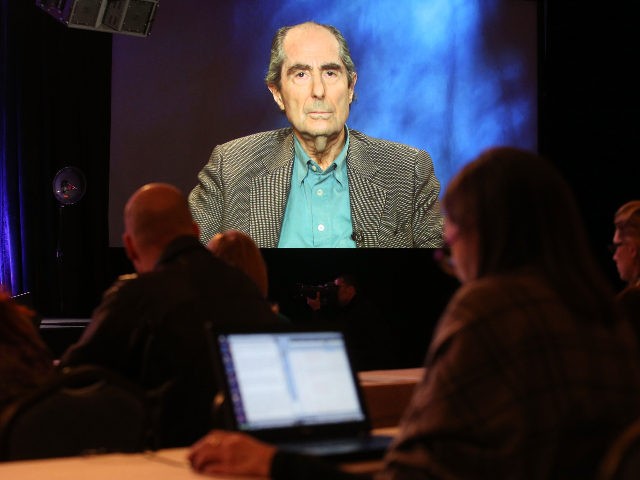 PASADENA, CA - JANUARY 14: An image of author Philip Roth is projected onscreen as he spea