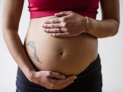 Kerstin Linnartz poses during a portrait session announcing her pregnancy on November 28,