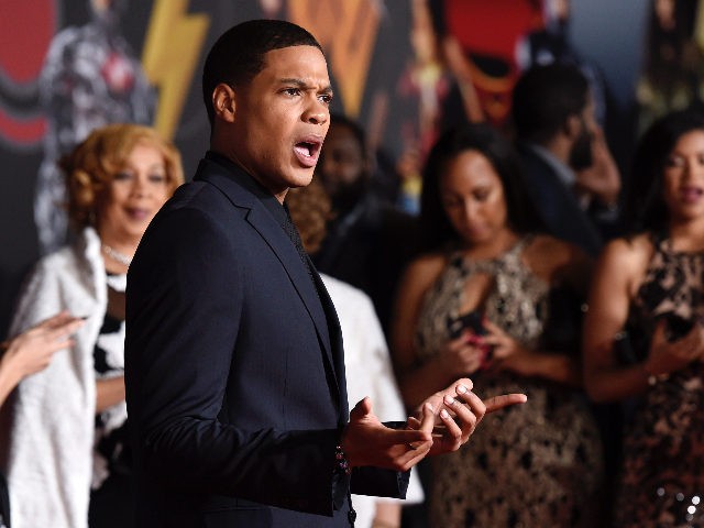 Ray Fisher, a cast member in "Justice League," poses at the premiere of the film