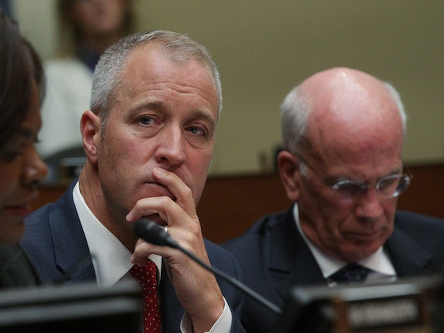 U.S. Rep. Sean Patrick Maloney (D-NY) (C) listens as Acting Director of National Intellige