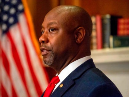 Sen. Tim Scott (R-SC) is seen as he participates in a photo op with President Donald Trumps Supreme Court nominee Judge Amy Coney Barrett prior to their meeting in the US Capitol on September 30, 2020, in Washington, DC. (Photo by Bonnie Cash / POOL / AFP) (Photo by BONNIE …