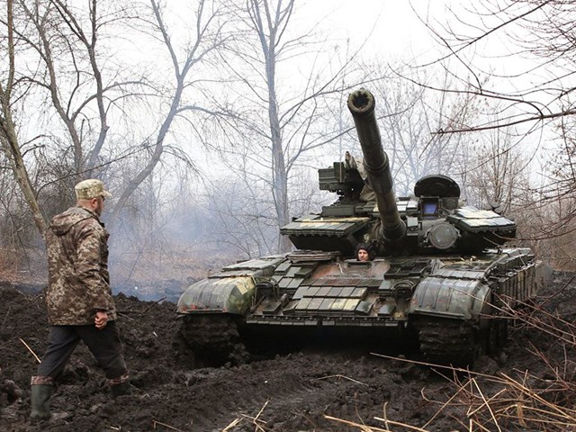 Ukrainian servicemen work on their tank close to the front line with Russian-backed separatists near Lysychansk, Lugansk region on April 7, 2021. - Ukrainian President Volodymyr Zelensky has urged NATO to speed up his country's membership into the alliance, saying it was the only way to end fighting with pro-Russia separatists. (Photo by STR / AFP) (Photo by STR/AFP via Getty Images)