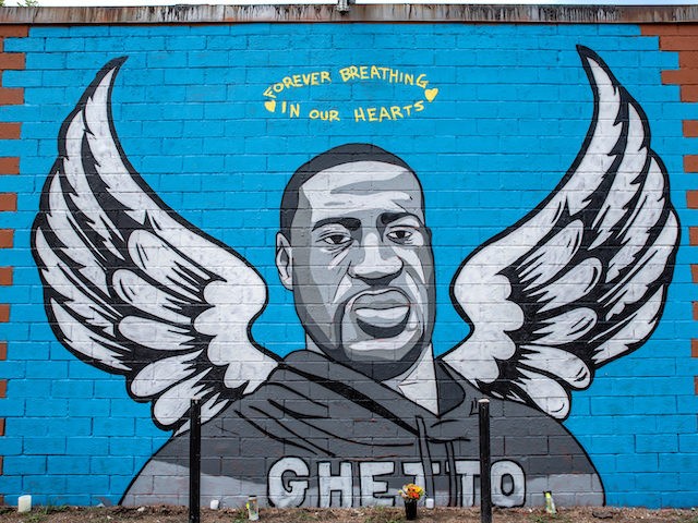 HOUSTON, TX - JUNE 02: A mural of George Floyd was painted on the side of Scott Food Mart in Houston's Third Ward overnight before a march in his honor on June 2, 2020 in Houston, Texas. Members of George Floyd's family will participate in a march that will go …