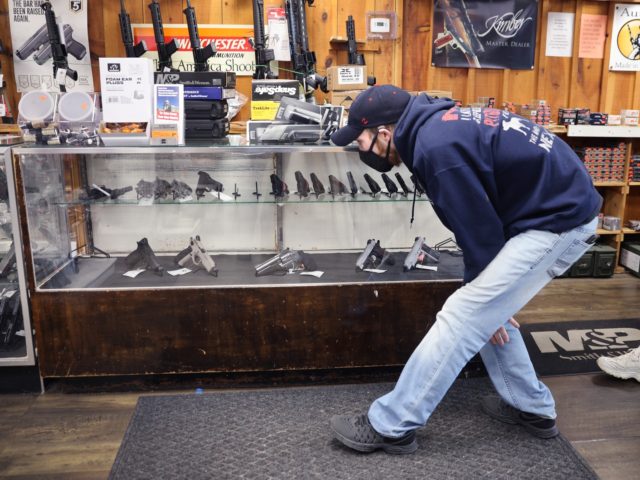 TINLEY PARK, ILLINOIS - APRIL 08: Alexander Carey shops for a new handgun at Freddie Bear Sports on April 08, 2021 in Tinley Park, Illinois. President Joe Biden today announced gun control measures which included stricter controls on the purchase of homemade firearms, commonly referred to as Ghost Guns and …