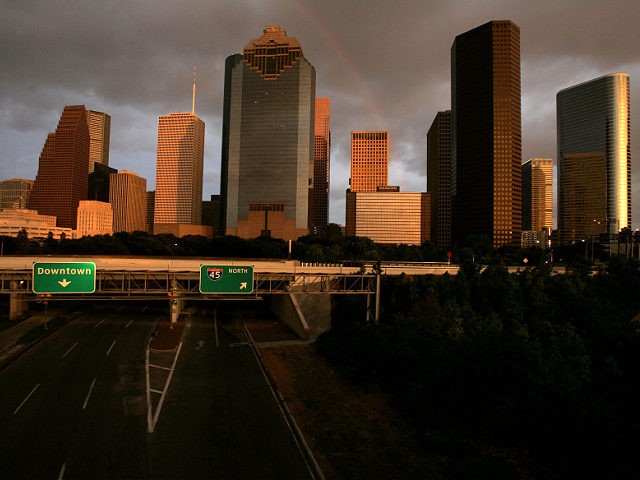 Interstate 45 is empty as clouds from Hurricane Rita move over Houston, Texas, Friday, Sept. 23, 2005, as the sun sets. (AP Photo/Paul Sancya)