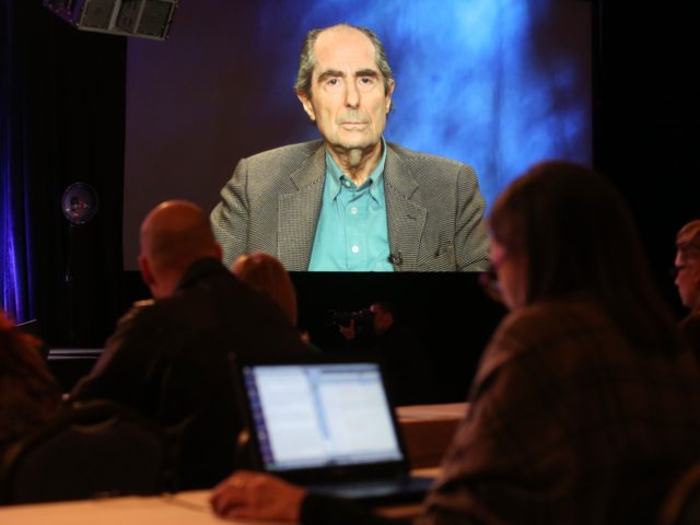 PASADENA, CA - JANUARY 14: An image of author Philip Roth is projected onscreen as he spea