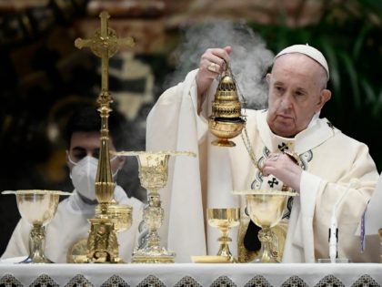 Pope Francis swings a thurible of incense as he prepares to celebrate the Eucharist during Easter Mass on April 04, 2021 at St. Peter's Basilica in The Vatican during the Covid-19 coronavirus pandemic. (Photo by Filippo MONTEFORTE / POOL / AFP) (Photo by FILIPPO MONTEFORTE/POOL/AFP via Getty Images)