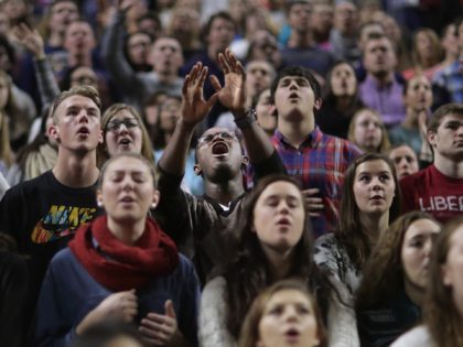 LYNCHBURG, VA - JANUARY 18: Thousands of students, supporters and invited guests sing song