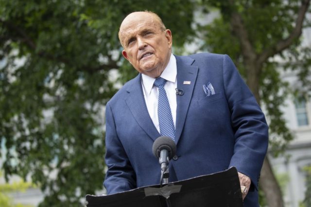 Federal agents search Rudy Giuliani's apartment, office