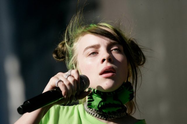 Billie Eilish is constricted by snake in 'Your Power' music video