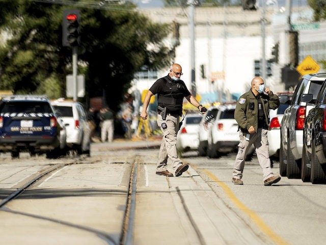 Law enforcement officers respond to the scene of a shooting at a Santa Clara Valley Transp