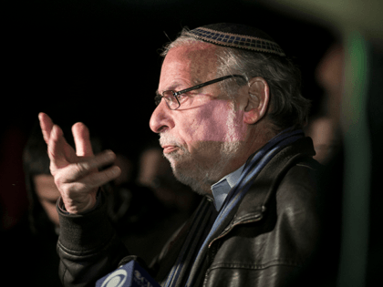 N.Y. state Assemblyman Dov Hikind speaks in Monsey, N.Y., Sunday, Dec. 29, 2019, following a stabbing late Saturday during a Hanukkah celebration. A man attacked the celebration at a rabbi's home north of New York City late Saturday, stabbing and wounding several people before fleeing in a vehicle, police said. …