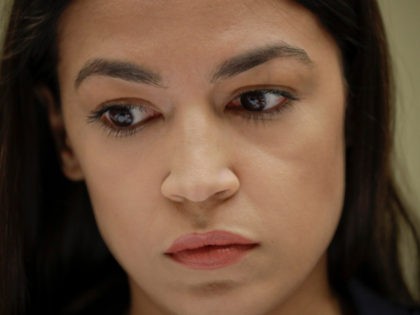 Rep. Alexandria Ocasio-Cortez, D-NY., waits to testify before the House Oversight Committe