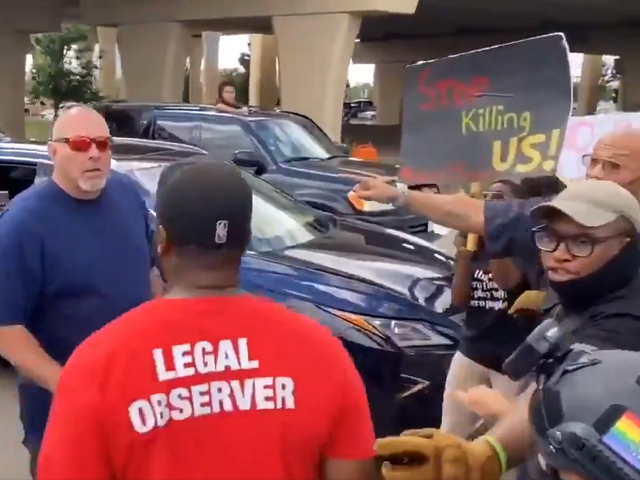 Texas man confronts Black Lives Matter protesters in Plano, Texas, after they blocked a ma