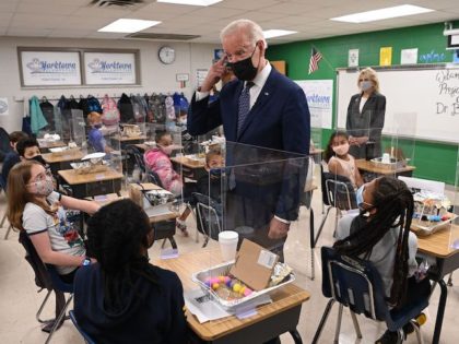 US President Joe Biden(C) and First Lady Jill Biden(R) visit the classroom of fifth-grade teacher Cindy Bertamini, at Yorktown Elementary School in Yorktown, Virginia on May 3, 2021. (Photo by MANDEL NGAN / AFP) (Photo by MANDEL NGAN/AFP via Getty Images)
