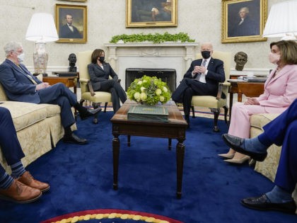 President Joe Biden speaks during a meeting with congressional leaders in the Oval Office of the White House, Wednesday, May 12, 2021, in Washington. From left, House Minority Leader Kevin McCarthy of Calif., Senate Minority Leader Mitch McConnell of Ky., Vice President Kamala, Biden, House Speaker Nancy Pelosi of Calif., …