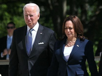 (L-R) US President Joe Biden, Vice President Kamala Harris, and US Defense Secretary Lloyd Austin arrive to take part in a wreath laying in front of Tomb of the Unknown Soldier at Arlington National Cemetery on Memorial Day in Arlington, Virginia on May 31, 2021. (Photo by MANDEL NGAN / …