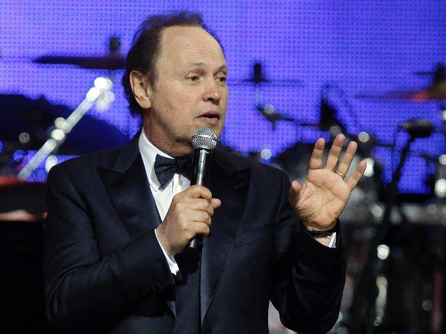 Actor Billy Crystal performs at Muhammad Ali's Celebrity Fight Night XIX at the JW Marriott Desert Ridge Resort and Spa, Saturday, March 23, 2013, in Phoenix. (Photo by Rick Scuteri/Invision/AP)