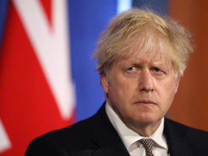 LONDON, UNITED KINGDOM – MAY 10: Britain’s Prime Minister Boris Johnson attends a virtual press conference to announce changes to lockdown rules in England at Downing Street on May 10, 2021 in London, England. Johnson announced that Step Three of England's roadmap out of lockdown can be enacted come May …