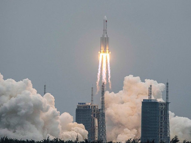 A Long March 5B rocket, carrying China's Tianhe space station core module, lifts off from the Wenchang Space Launch Center in southern China's Hainan province on April 29, 2021. - China OUT (Photo by STR / AFP) / China OUT (Photo by STR/AFP via Getty Images)