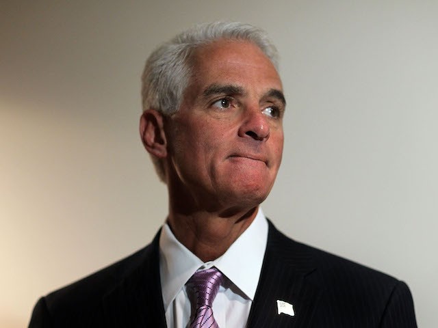 Florida Governor Charlie Crist looks on during a press conference after thanking workers helping Haitian victims of the earthquake in Port-au-Prince transition through the Miami International Airport on February 1, 2010 in Miami, Florida. The Governor spoke about the confusion surrounding some reports that the state of Florida had refused to accept anymore medical flights, he denied that was the case. (Photo by Joe Raedle/Getty Images)