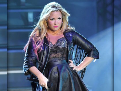 Demi Lovato performs on her summer concert tour at the Greek Theatre on Wednesday, July 18, 2012, in Los Angeles. (Photo by John Shearer/Invision/AP)