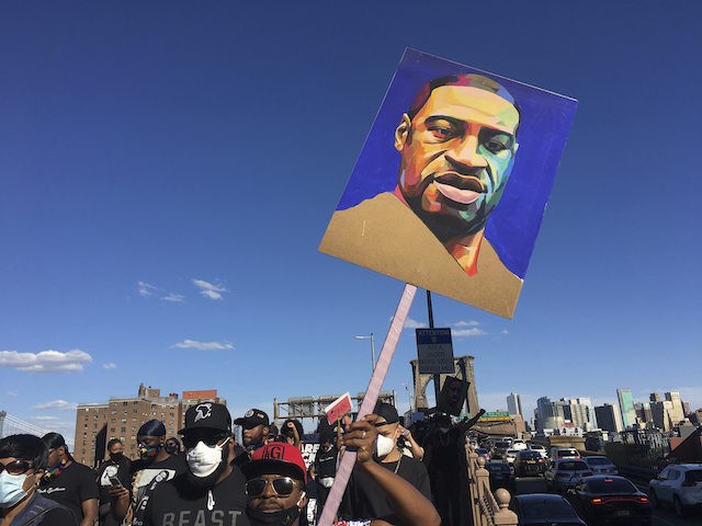 One year anniversary of the death of George Floyd. STAR MAX Photo: 6/13/20 Protesters march across the Brooklyn Bridge and down Broadway to bring attention to the wrongful death of George Floyd at the hands of Minneapolis Police Officers. A large contingent of Asian Protesters got behind the cause as …