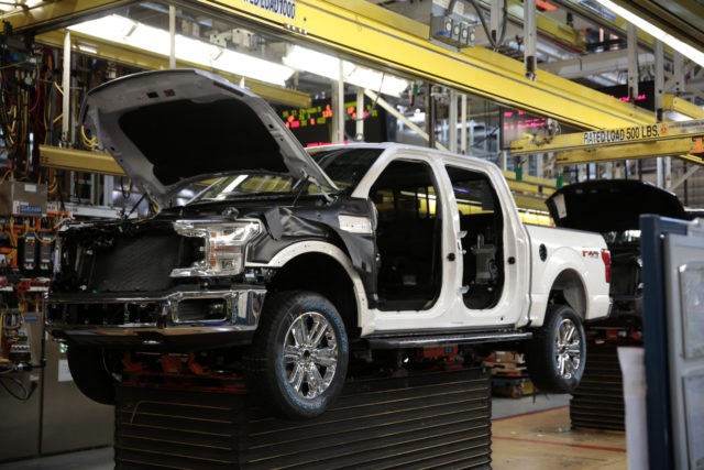 This photo shows Ford 2018 and 2019 F-150 trucks on the assembly line at the Ford Motor Co