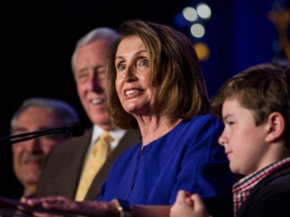 WASHINGTON, DC - NOVEMBER 06: House Minority Leader Nancy Pelosi (D-CA), joined by House Democrats, delivers remarks during a DCCC election watch party at the Hyatt Regency on November 6, 2018 in Washington, DC. (Photo by Zach Gibson/Getty Images)
