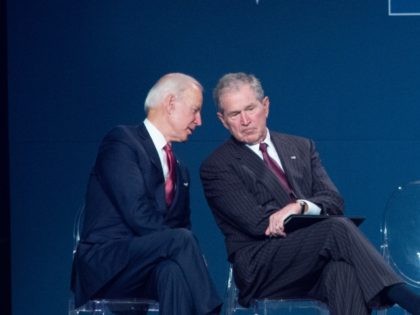 PHILADELPHIA, PA - NOVEMBER 11: Seated on the dais are former Vice President Joe Biden, fo