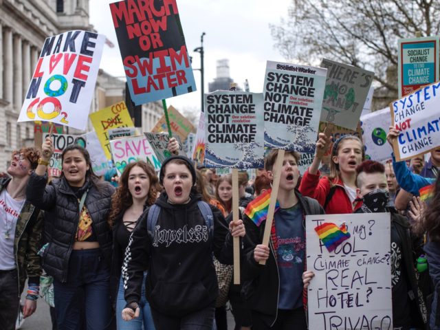 LONDON, ENGLAND - APRIL 12: Students take part in a Climate March on April 12, 2019 in London, United Kingdom. Students are protesting, urging the government to declare a climate emergency and take action over the problem. They are keen that the national curriculum is reformed and the environmental crisis …