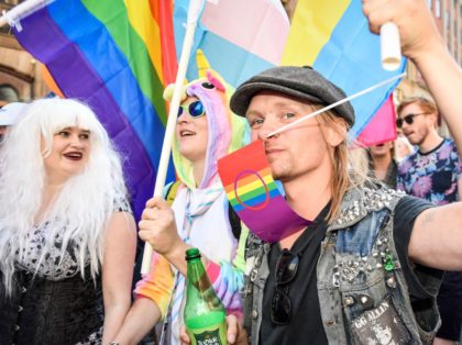 People take part in the annual Stockholm Pride Parade in Stockholm, Sweden, on August 3, 2019. (Photo by Stina STJERNKVIST / TT NEWS AGENCY / AFP) / Sweden OUT (Photo credit should read STINA STJERNKVIST/AFP via Getty Images)