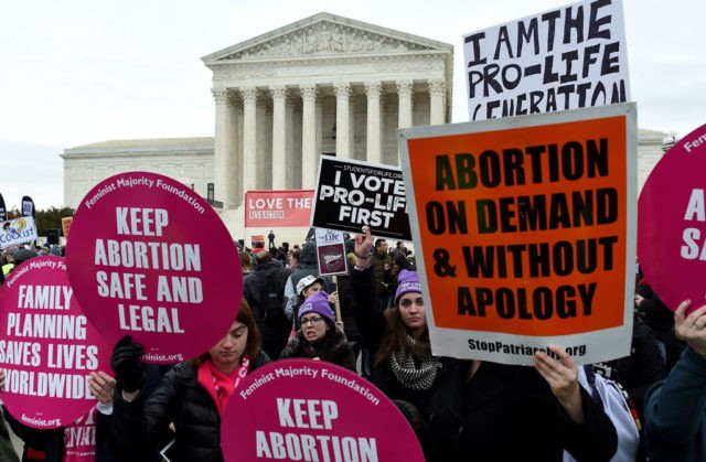 Pro-choice and pro-life activists demonstrate in front of the the US Supreme Court during the 47th annual March for Life on January 24, 2020 in Washington, DC. - Activists gathered in the nation's capital for the annual event to mark the anniversary of the Supreme Court Roe v. Wade ruling …