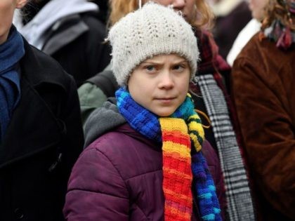 Swedish climate activist Greta Thunberg looks on as she takes part in a "Youth Strike 4 Climate" protest march on March 6, 2020 in Brussels. (Photo by JOHN THYS / AFP) (Photo by JOHN THYS/AFP via Getty Images)