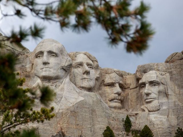 Mount Rushmore National Memorial on April 23, 2020, in Keystone, South Dakota. - The steep roads that wind their way to Mount Rushmore are completely deserted. The South Dakota tourist mecca attracts only a few clusters of visitors happy to escape the confinement caused by the coronavirus pandemic. (Photo by …