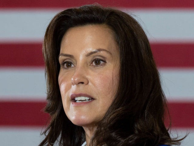Michigan Governor Gretchen Whitmer introduces Democratic Presidential Candidate Joe Biden to speak at Beech Woods Recreation Center in Southfield, Michigan, on October 16, 2020. - Joe Biden on October 16, 2020 described President Donald Trump's reluctance to denounce white supremacists as "stunning" in a hard-hitting speech in battleground Michigan with …