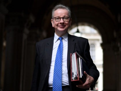LONDON, ENGLAND - OCTOBER 23: UK Chancellor of the Duchy of Lancaster, Michael Gove, is seen leaving the Foreign and Commonwealth Office and walking to Downing Street on October 23, 2020 in London, England. (Photo by Leon Neal/Getty Images)