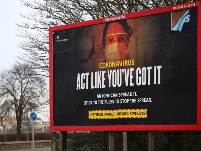 LONDON, ENGLAND - FEBRUARY 13: A coronavirus billboard near Heathrow Airport on February 13, 2021 in London, England. From 15 February travellers to the UK from a country on the UK's travel ban "red list" will be required to quarantine in a government-approved facility for ten days at their own …
