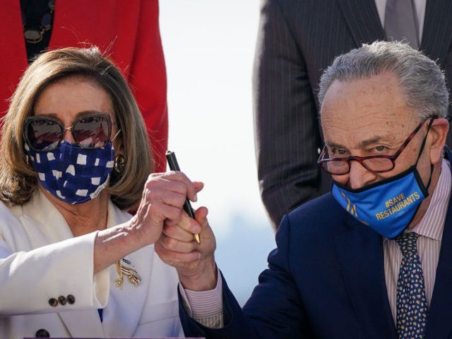 WASHINGTON, DC - MARCH 10: Surrounded by Democratic House and Senate Committee Chairs, Spe