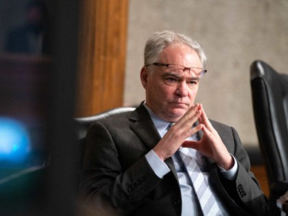 Senator Tim Kaine, D-Va., listens during a hearing to examine United States Special Operations Command and United States Cyber Command in review of the Defense Authorization Request for fiscal year 2022 and the Future Years Defense Program, on Capitol Hill, March 25, 2021, in Washington, DC. (Photo by Anna Moneymaker …